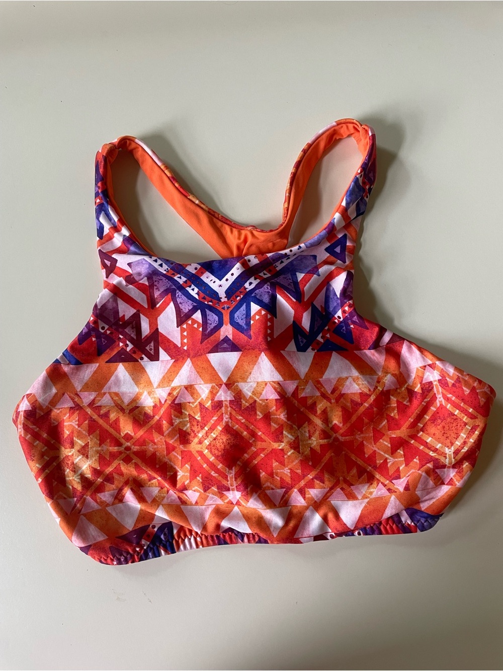 Becca Vibrant Orange and Purple Geometric Crop Swim Top, size s